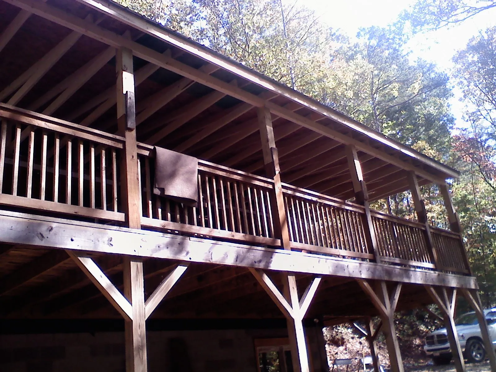 Timber framing under a new elevated porch and deck — Roof Leak Repair in Goodview by Roofing Brothers